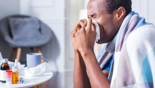 Person blowing their nose