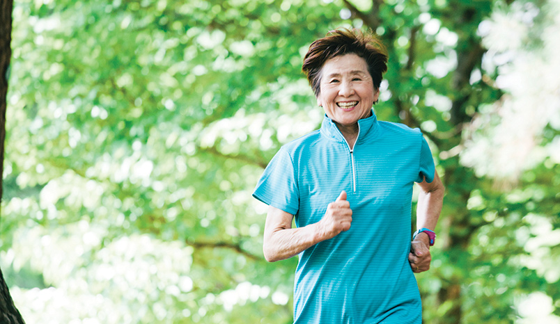 happy woman in blue top running