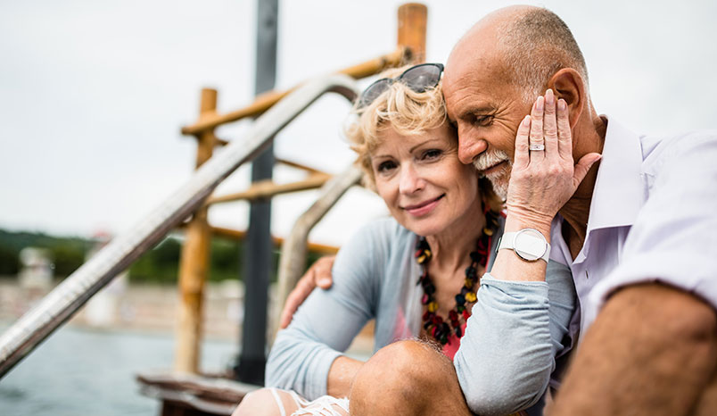 older-couple-sitting-together-outside