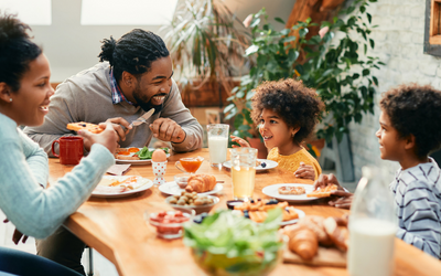 Family at dinner table.