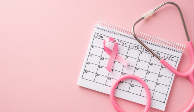 Calendar with breast cancer ribbon.