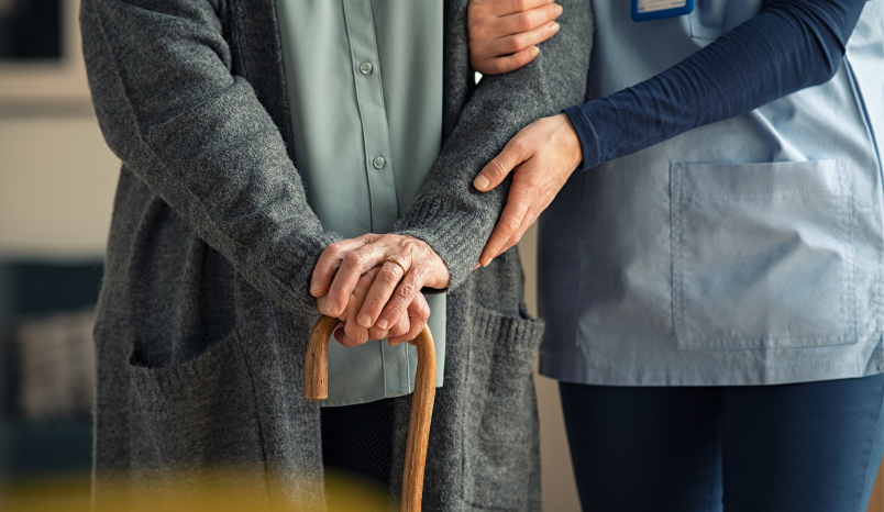 Older person at home with nurse.