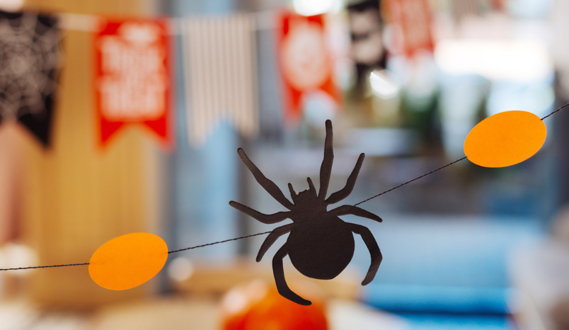 Paper cut out decoration of spider for Halloween.