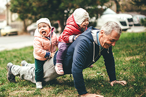 Senior Health man with children