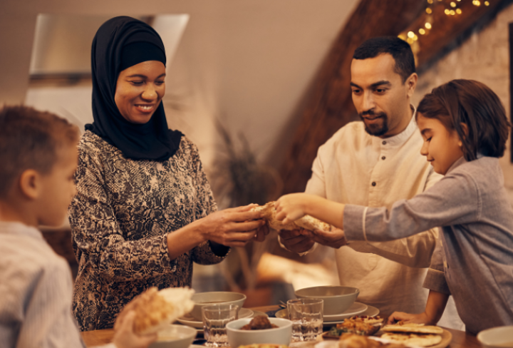 Family enjoying meal together during Ramadan.