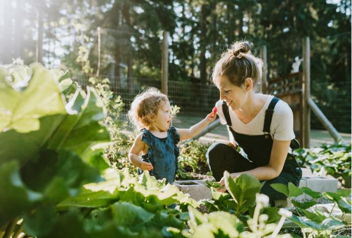 Mom and child gardening