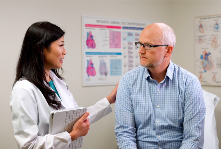 Patient consults with cardiologist.